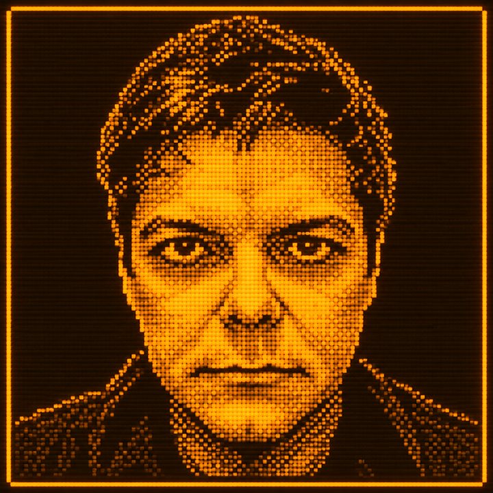 Retrato de Nikiforos em pontos luminosos laranja